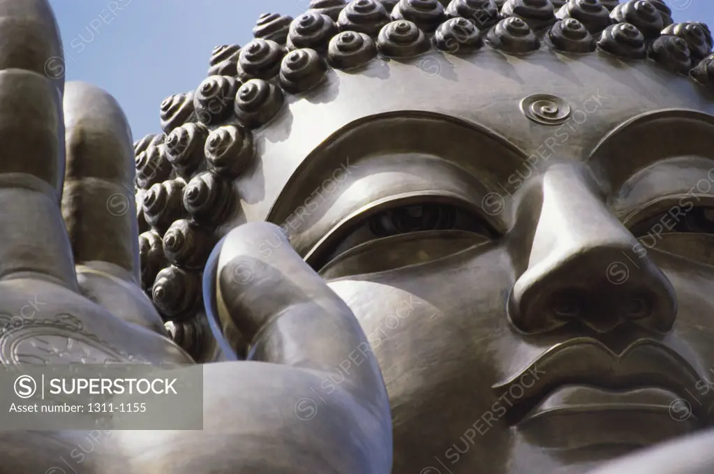 Close-up of a statue of Buddha, Lentau Island, Hong Kong, China