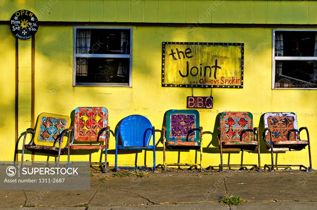 Colorful chairs at a bar-be-que restaurant, The Joint, Bywater, Ninth Ward, New Orleans, Louisiana, USA