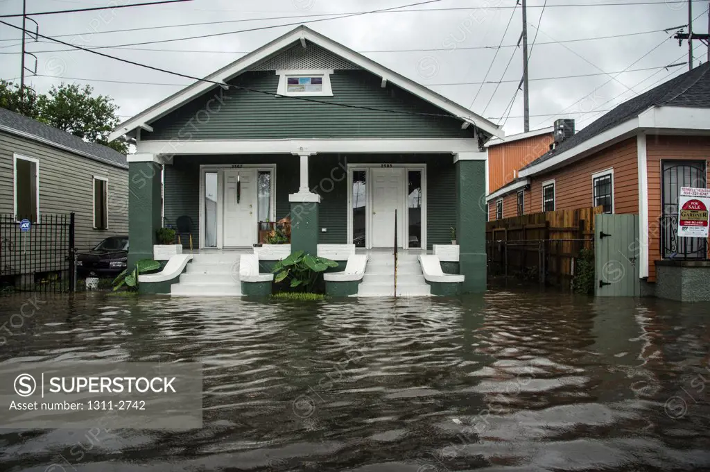 After a hard rain, Orleans Street in New Orleans, floods.
