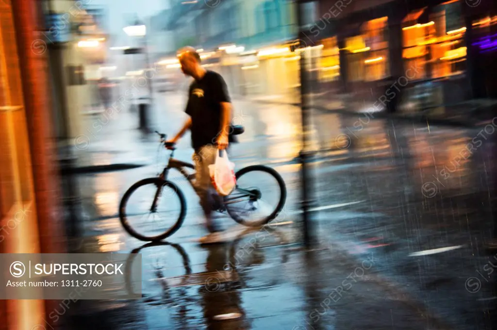 Biking through The French Quarter in a storm.