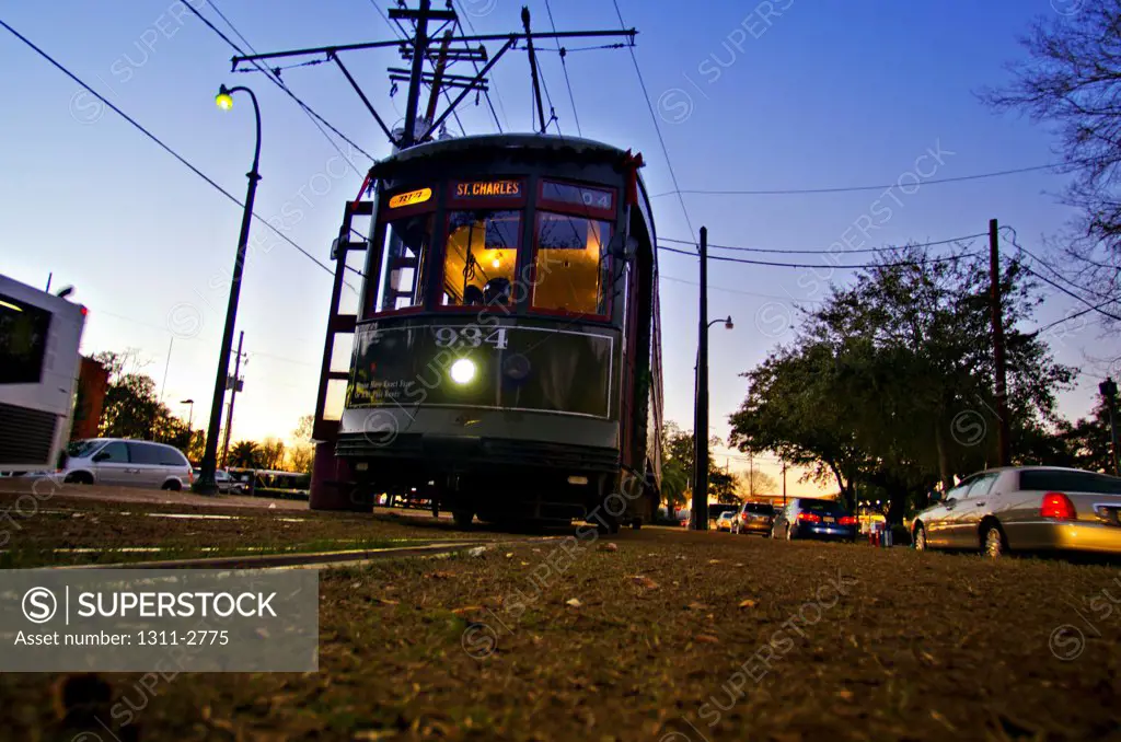 St. Charles (Green) Streetcar at Carollton Street in Uptown, New Orleans, photographed from a very low angle.