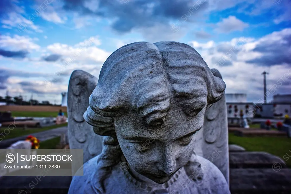 Detail of an Angel found at  Holy Rosary cemetery in St. Charles Parish, Louisiana.