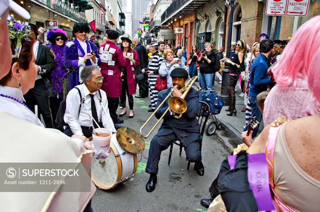 Jazz musicians help to celebrate the beginning of Mardi Gras in The French Quarter of New Orleans.