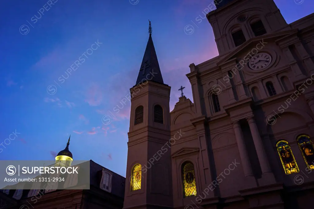St. Louis Cathedral, the heart of New Orleans and located in The French Quarter as dusk falls on the city.
