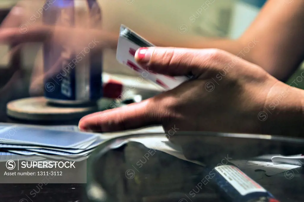 A card game. Poker, beer and cigarettes