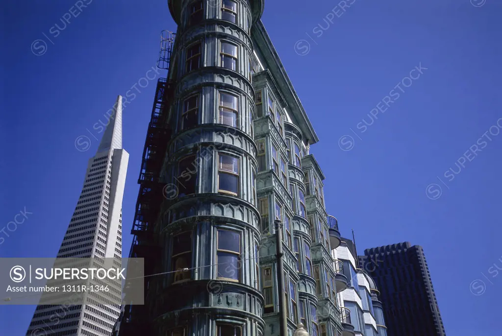 Low angle view of Transamerica Pyramid and Columbus Tower, San Francisco, California, USA