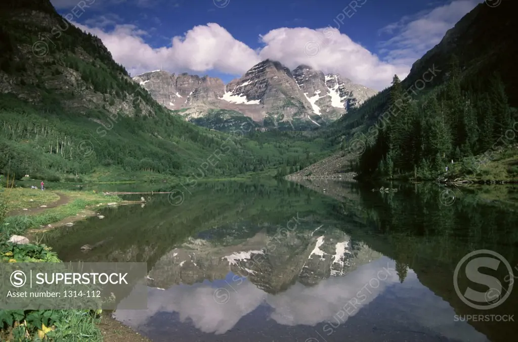 Reflection of mountains in a lake, Maroon Bells-Snowmass Wilderness, Colorado, USA