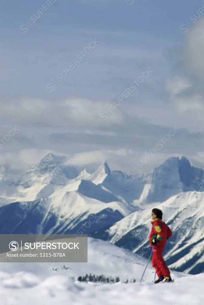 Side profile of a young man skiing, Banff National Park, Alberta, Canada