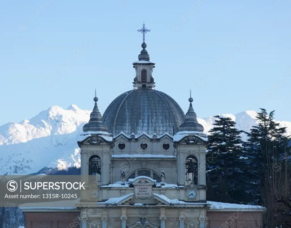 Italy, Piedmont, Cuneo province, Santa Maria Rocca, Church and mountains