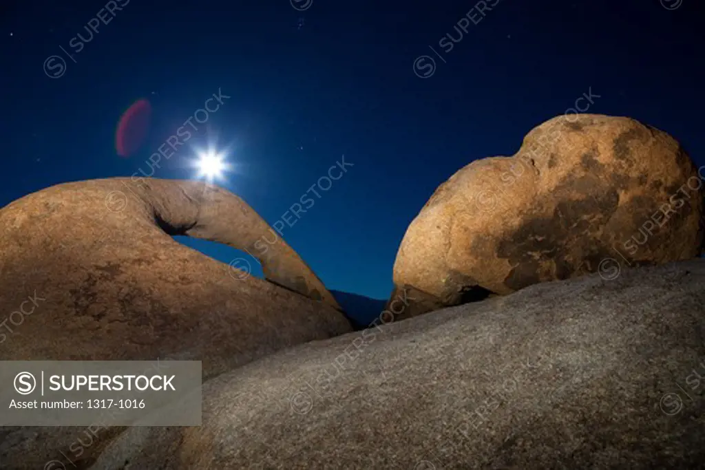 Low angle view of a natural arch, Mobius Arch, Alabama Hills, Lone Pine, California, USA