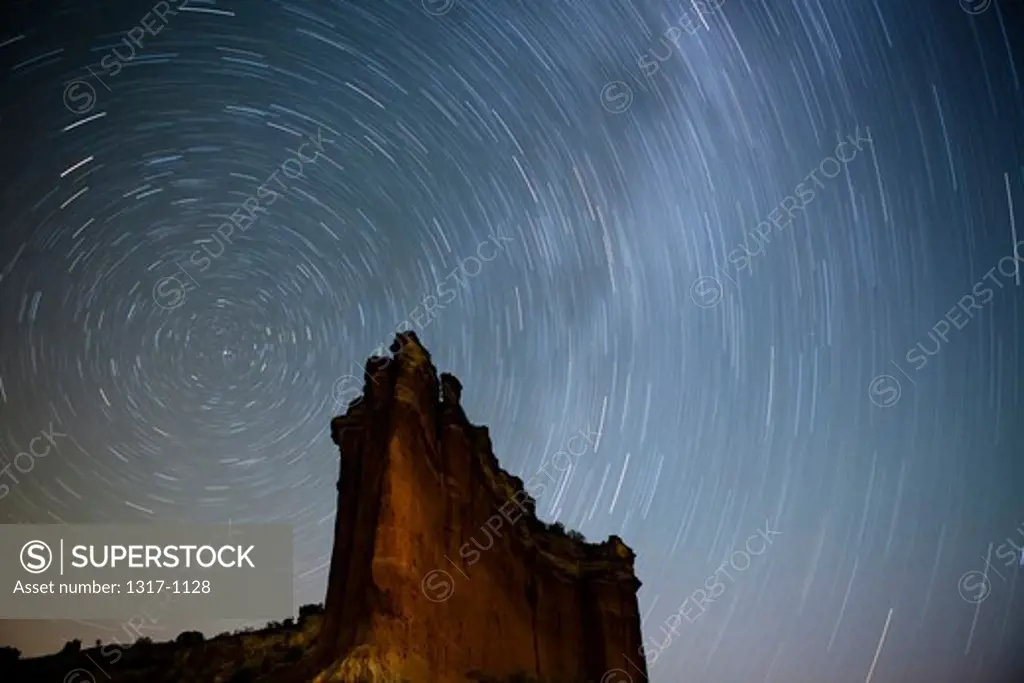 Stars that make up the Milky Way rotate around the Northern celestial pole, Caprock Canyon, Texas, USA