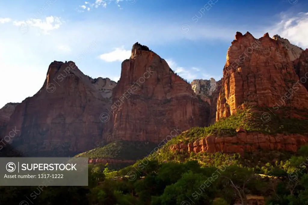 USA, Utah, Zion National Park,  Majestic peaks of towers of Three Patriarchs at sunset