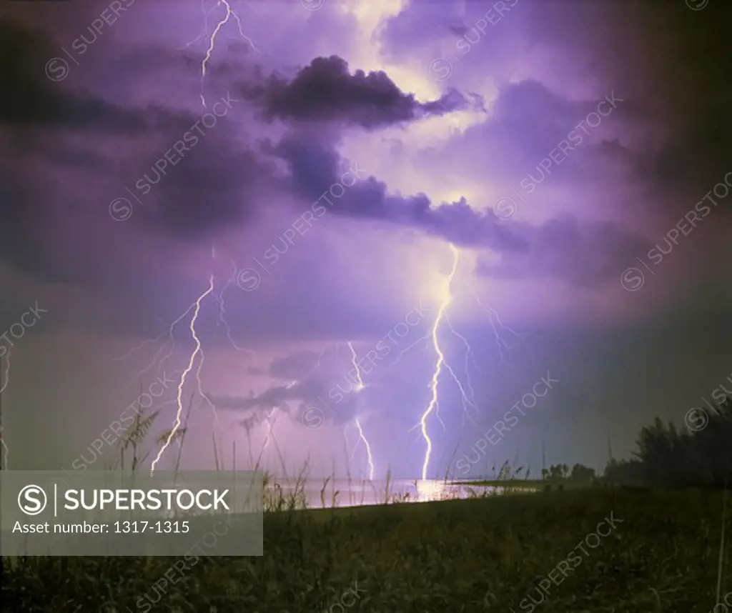 USA, Florida, Lightning strike over beach