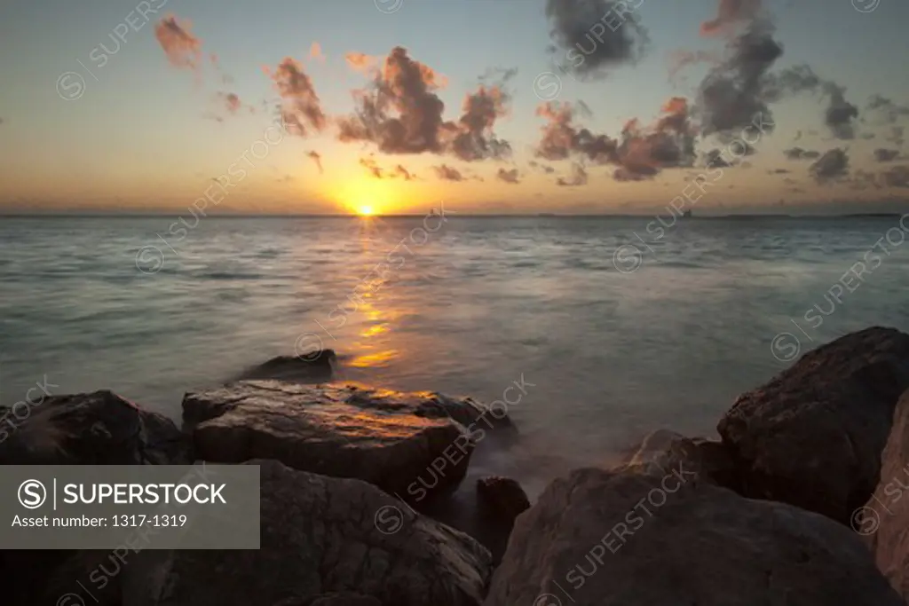 USA, Florida, Key West, Rocky shoreline during sunset