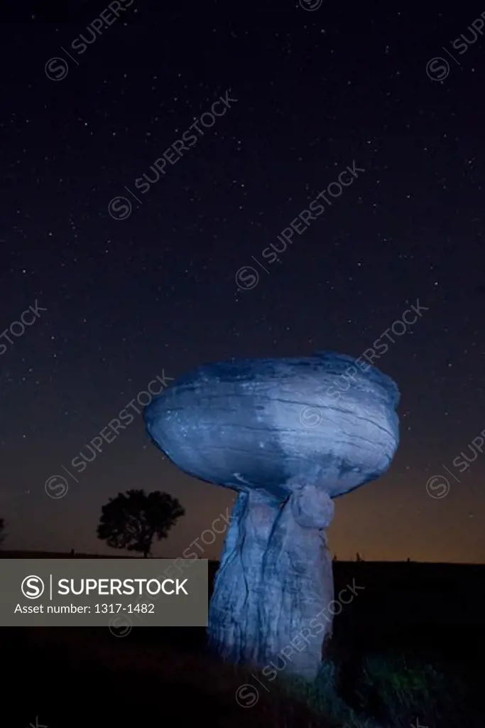 Hoodoo rock at dusk, Mushroom Rock State Park, Kansas, USA
