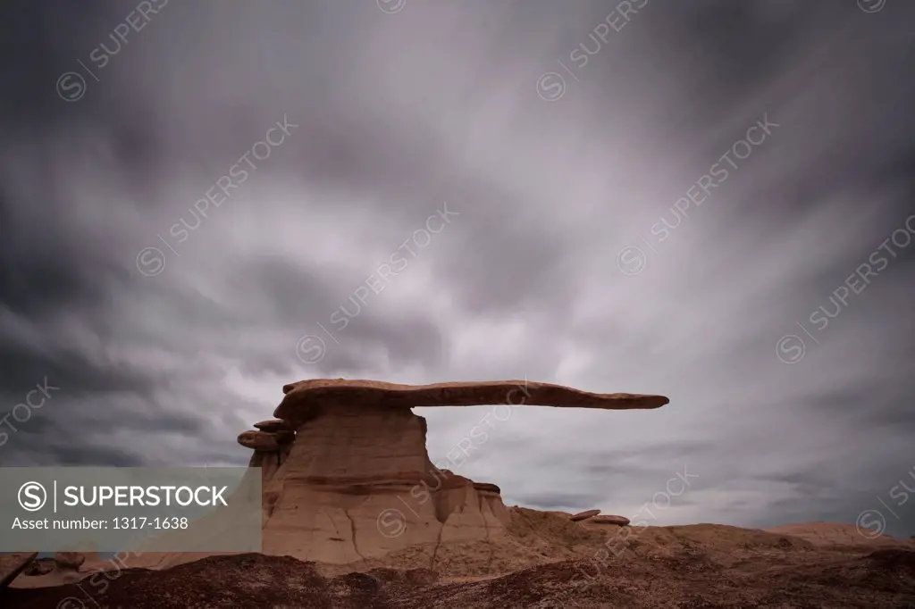 USA, New Mexico, Carson National Forest, Amazing rock formation against moody sky