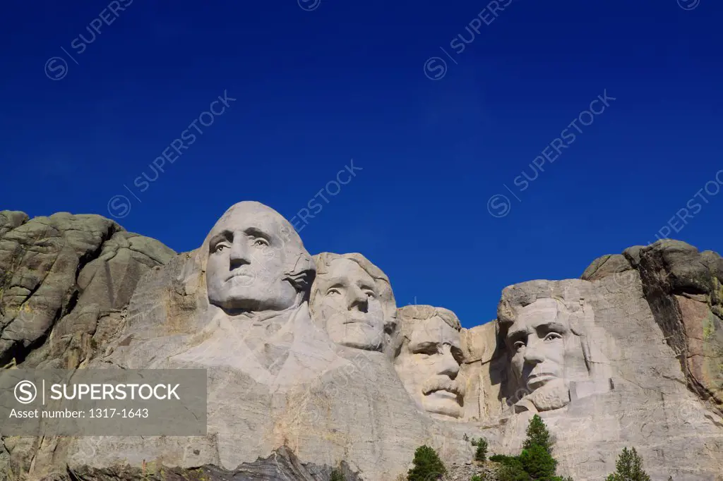 USA, South Dakota, Mount Rushmore National Monument against blue sky