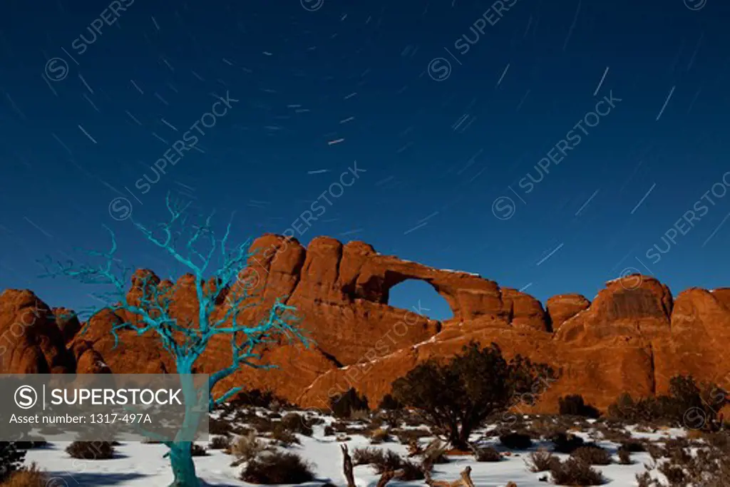 USA, Utah, Arches National Park, Star trails at Skyline Arch