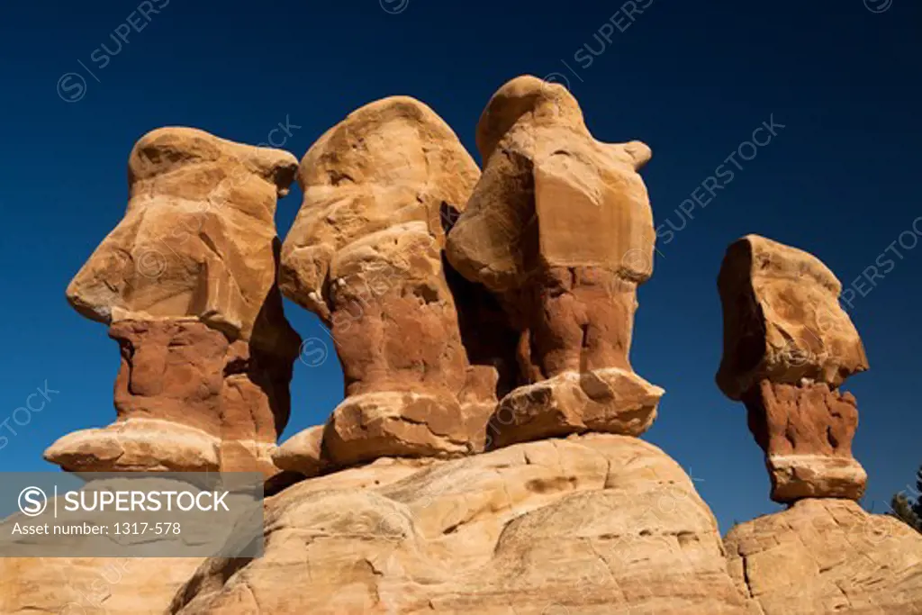 Low angle view of hoodoo rock formations, Devil's Garden, Grand Staircase-Escalante National Monument, Utah, USA