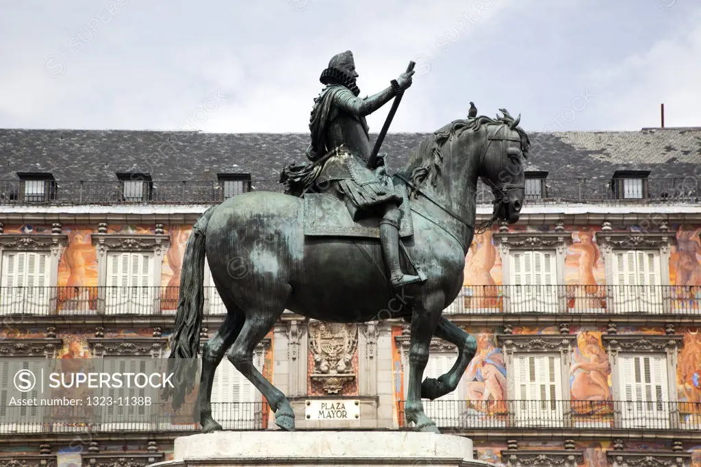 Statue of Felipe III in front of a palace, Plaza Mayor, Madrid, Spain