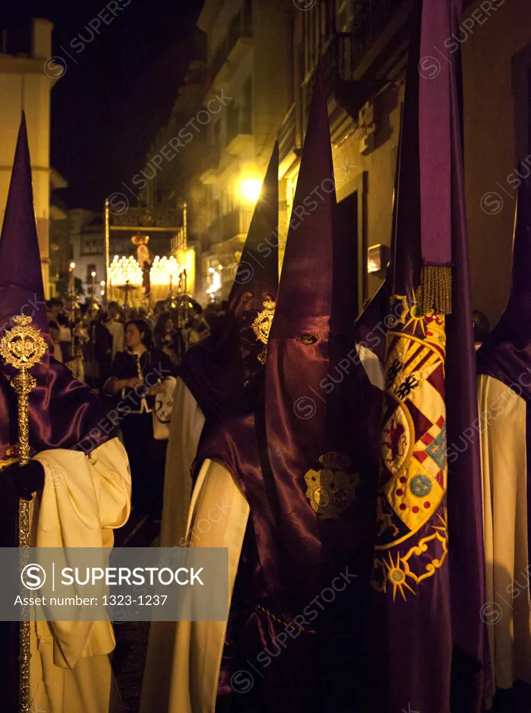 Spain, Seville, Procession of Nazarenes at night