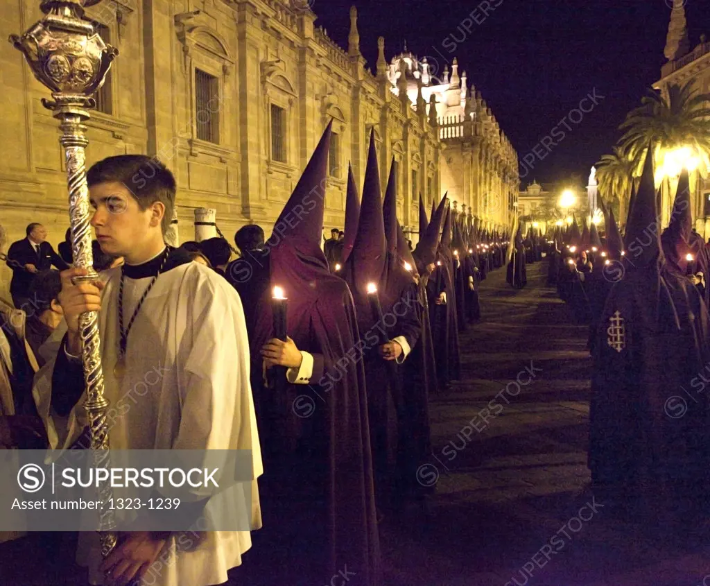 Spain, Seville, Ciriales and Nazarenes in procession