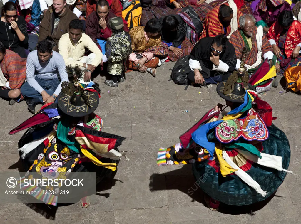 Dancers performing black hat dance in traditional Paro Tsechu festival, Paro, Bhutan