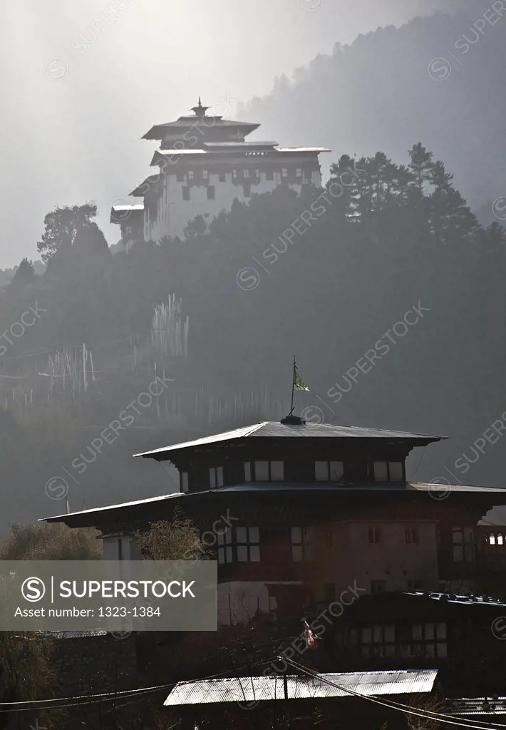Building with Jakar Dzong in the background, Bumthang, Bhutan