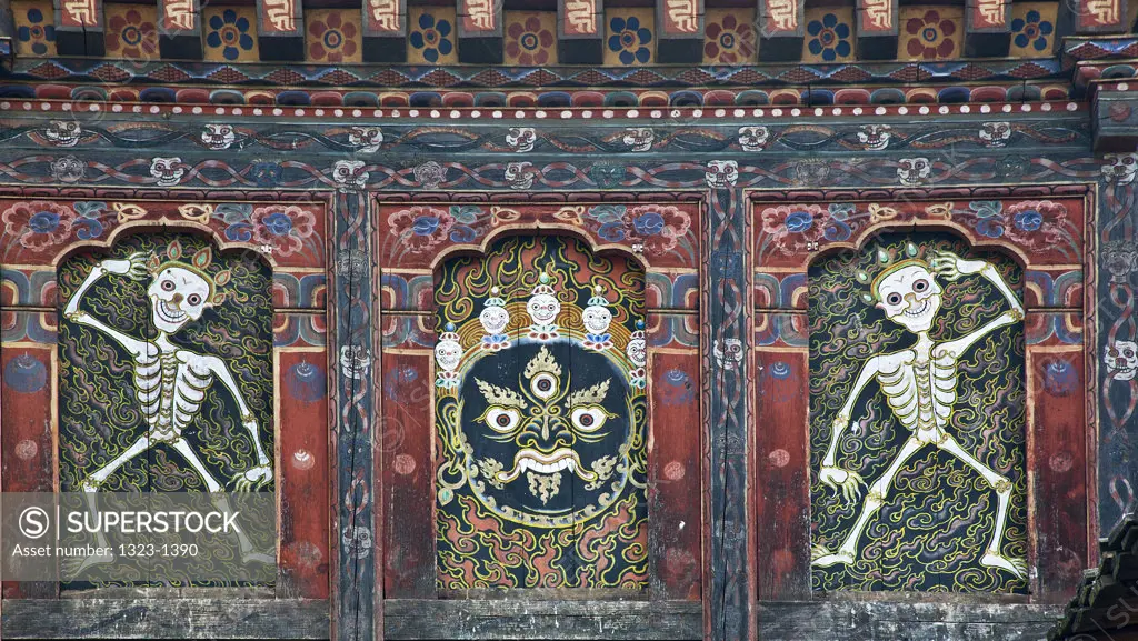 Buddhist paintings on a monastery wall, Bhutan