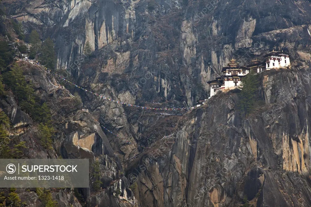 Low angle view of a monastery on a mountain, Taktsang Monastery, Paro Valley, Paro District, Bhutan
