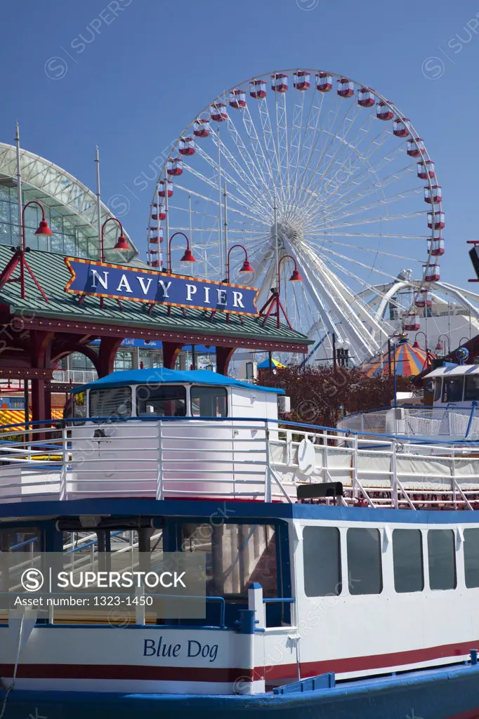 Recreational boat at a pier with ferris wheel in the background, Navy Pier, Chicago, Cook County, Illinois, USA