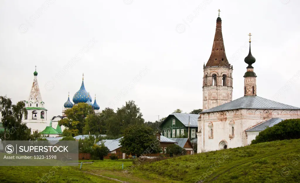 Church and houses in a city, Suzdal, Russia