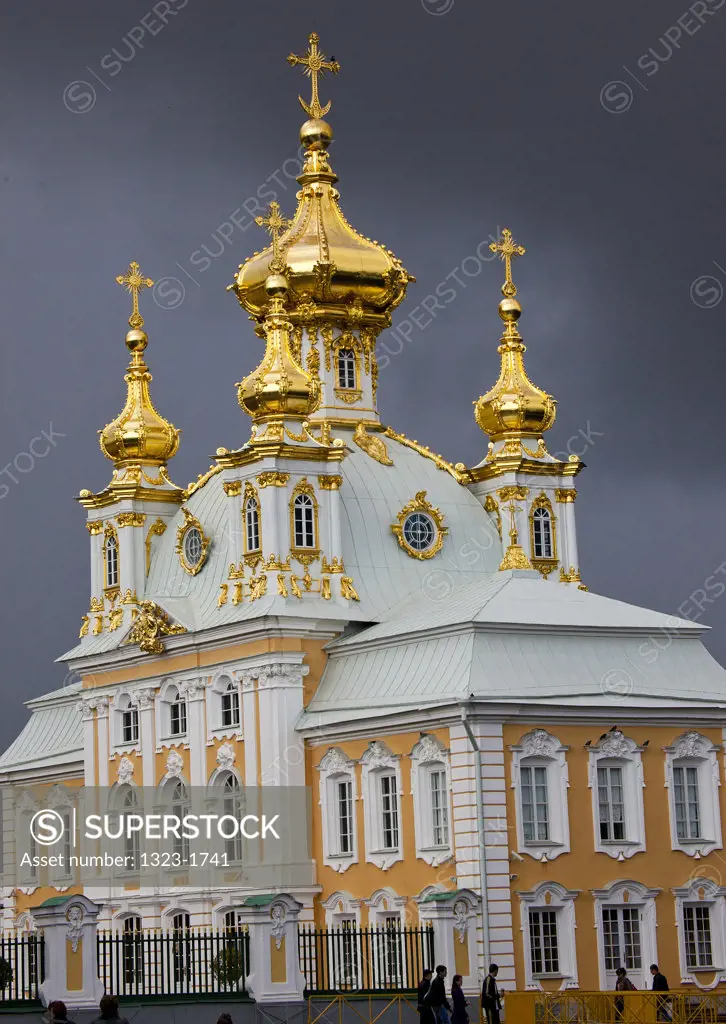 Tourists at a church of Peterhof Grand Palace, Petrodvorets, St. Petersburg, Russia