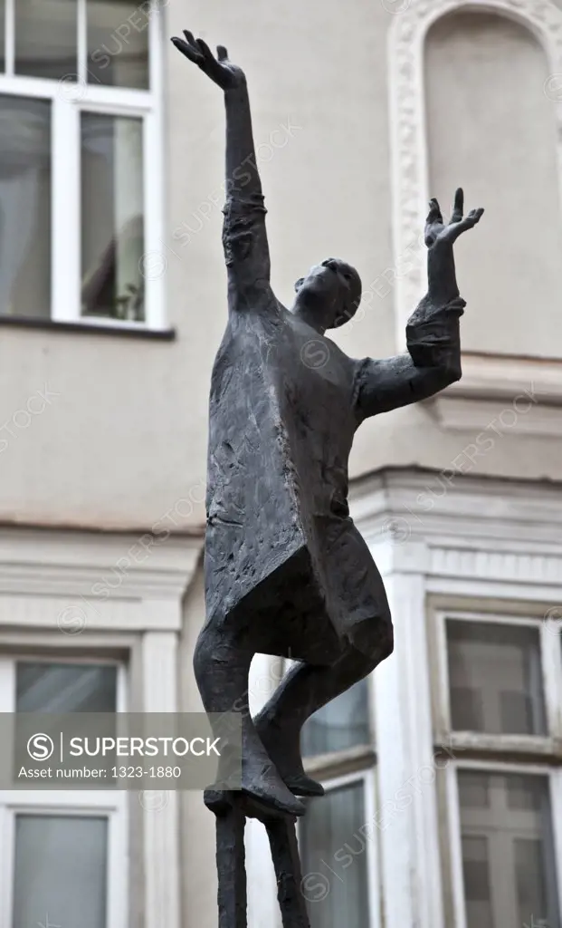 Low angle view of a statue of a dancing man, Vilnius, Lithuania