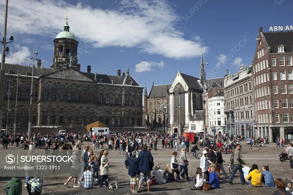 People at town square with City Hall, Dam Square, Amsterdam, Netherlands