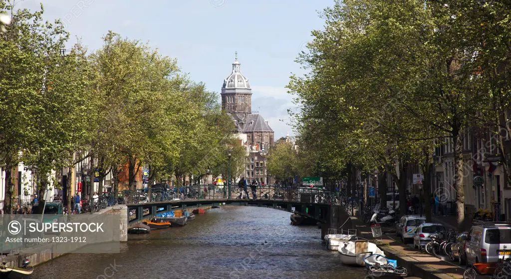 Canal with the Church of St. Nicholas in the background, Amsterdam, Netherlands