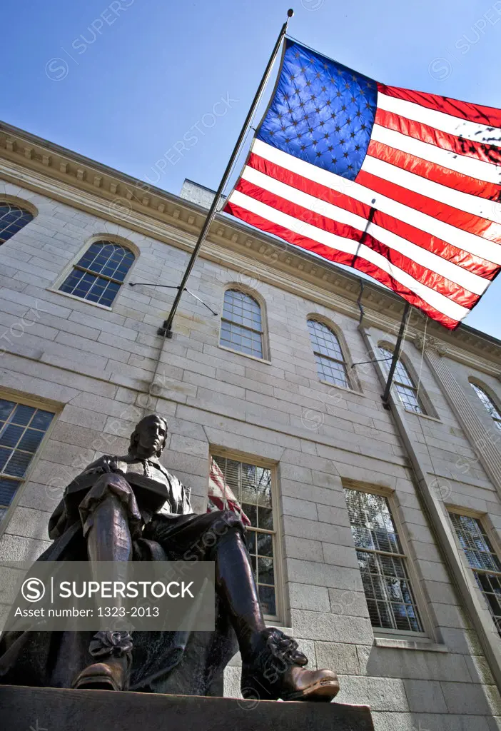 USA, Massachusetts, Cambridge, Low angled view of statue of John Harvard in Harvard Yard