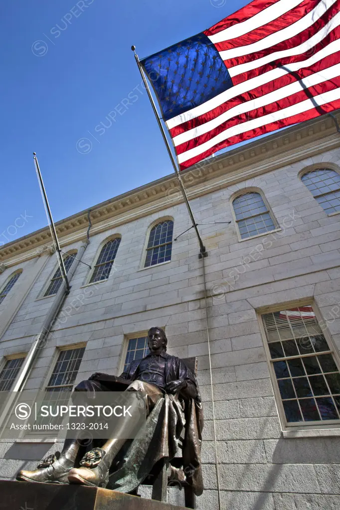 USA, Massachusetts, Cambridge, Low angled view of statue of John Harvard in Harvard Yard