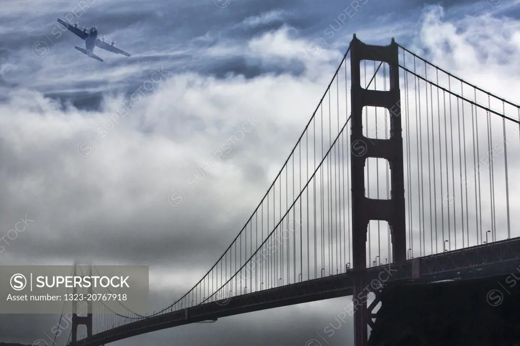 Blue Angels propeller plane flying over the Golden Gate Bridge