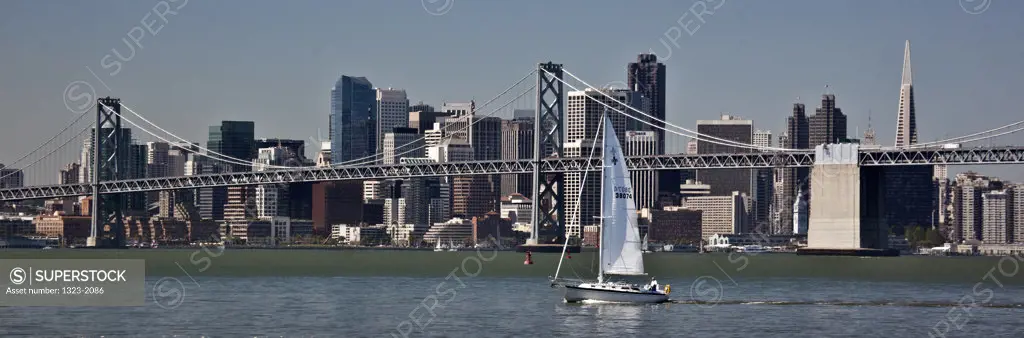 Sailboat and Downtown San Francisco viewed from Oakland, San Francisco Bay, California, USA