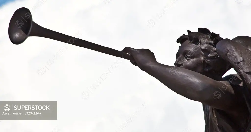 Angel blowing a horn on Samuel De Champlain statue, Quebec City, Quebec, Canada