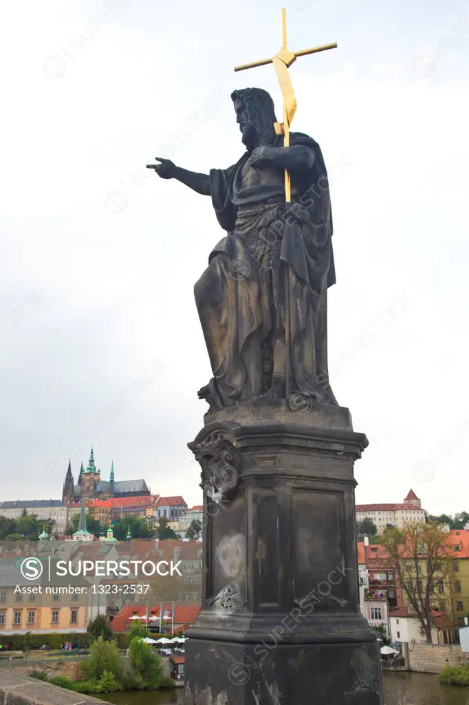 Czech Republic, Praque, Statue of St. John the Baptist on Charles Bridge