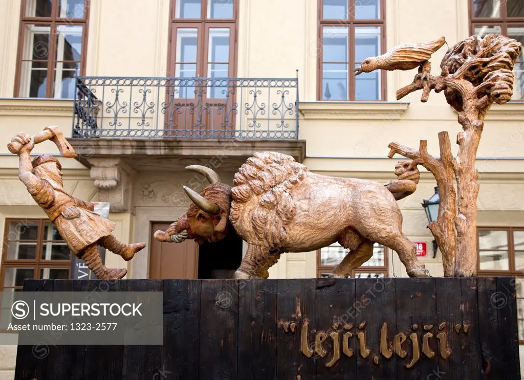 Czech Republic, Praque, Whimsical statue of bull and hunter