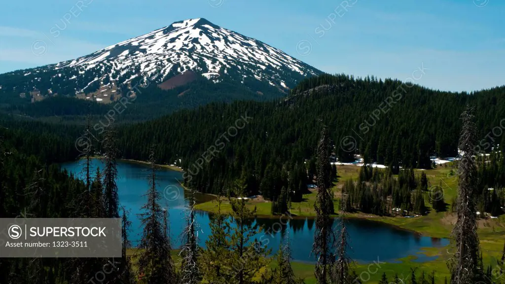 Lake with mountain range in the background, Todd Lake, Mt. Bachelor, Oregon, USA