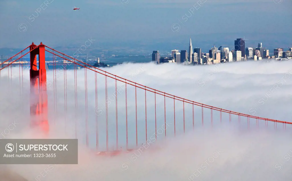 Fog over a suspension bridge, Golden Gate Bridge, San Francisco Bay, San Francisco, California, USA