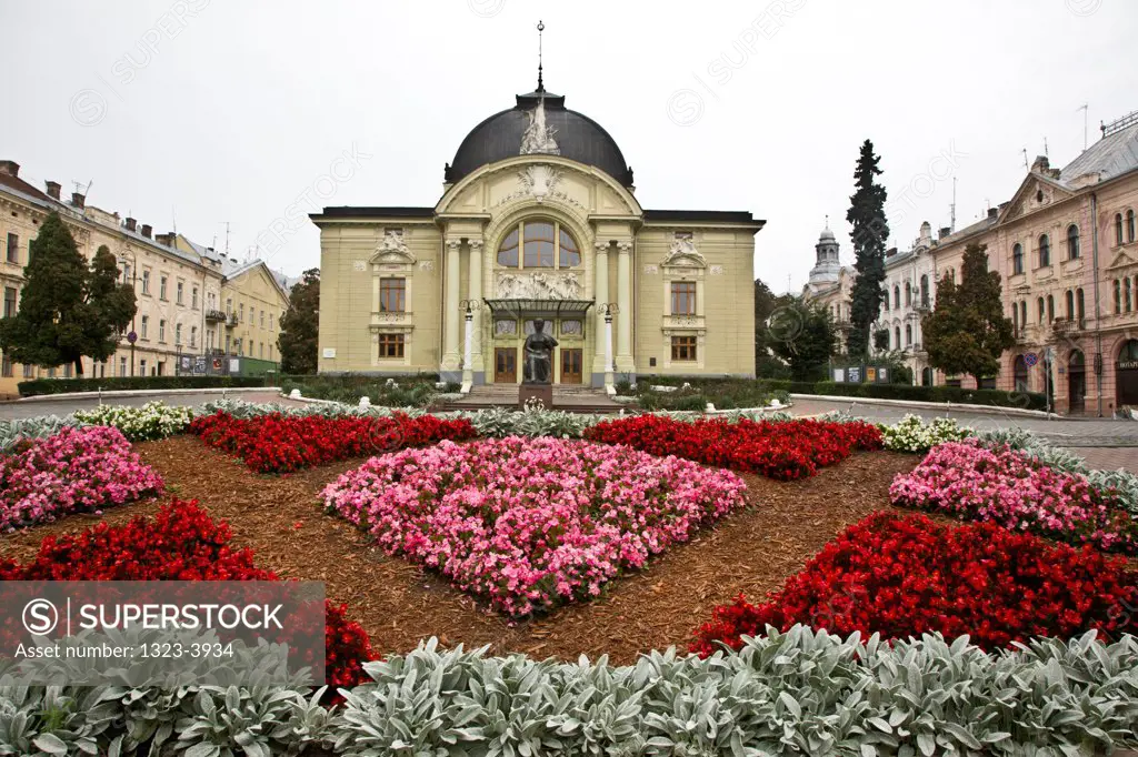 Flowers in a garden of Chernivtsi Music Drama Theater and Square, Chernivtsi, Ukraine