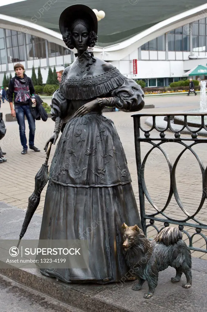 Belarus, Minsk, ""The Lady with small dog"" Street Sculptures at Komorovsky market place