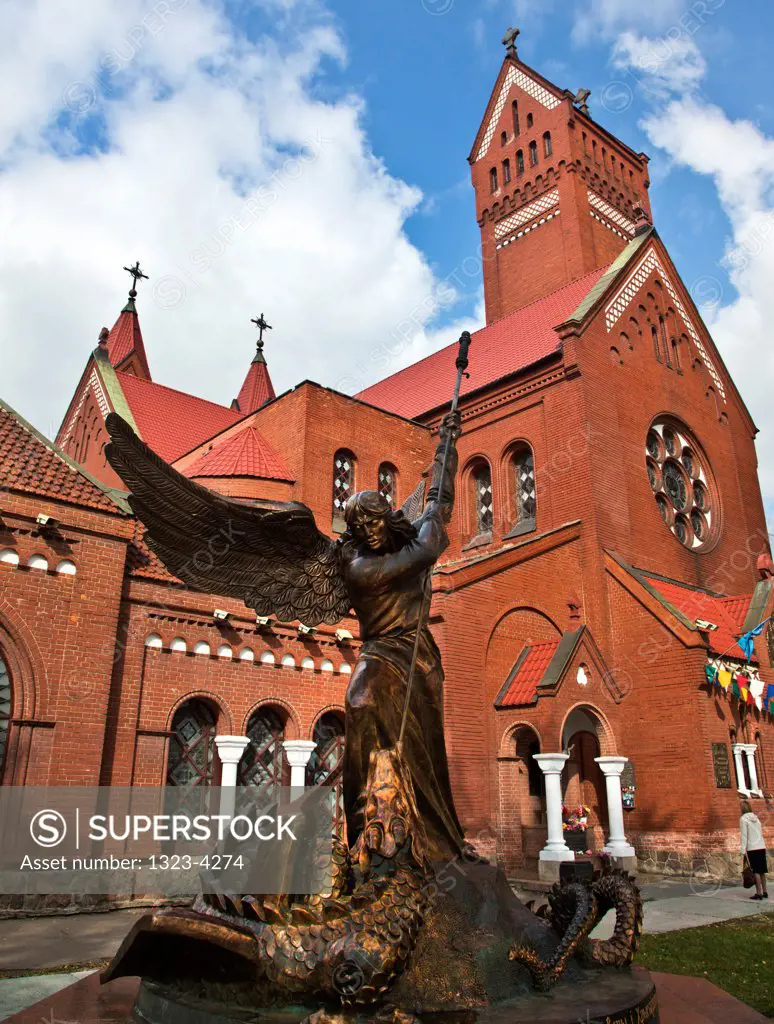 Belarus, Minsk, Statue of Archangel Michael in front of The Red Church