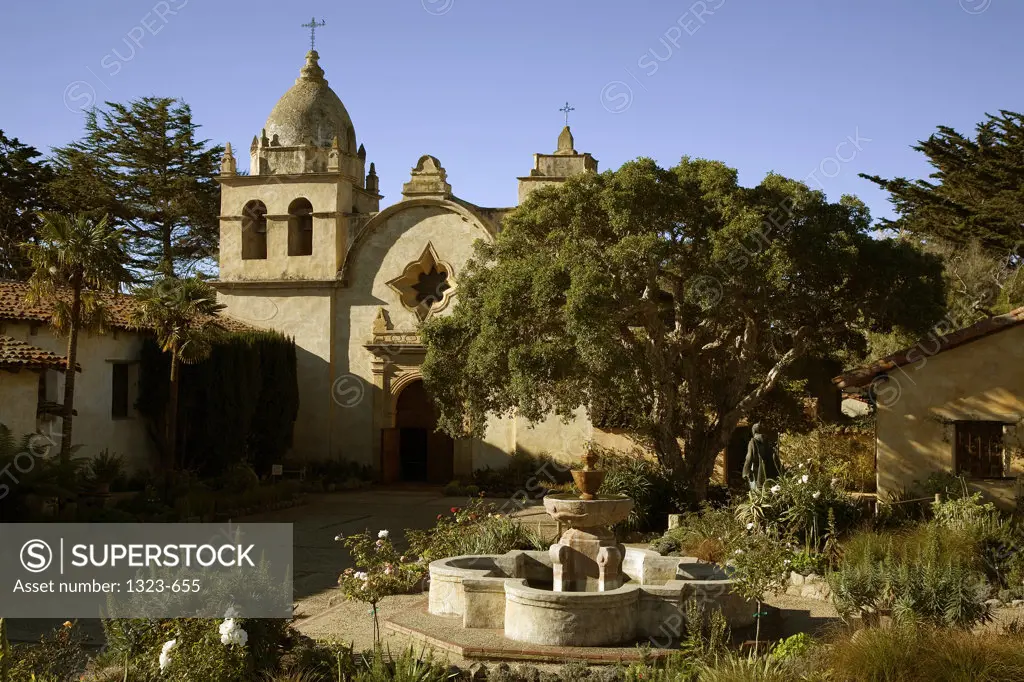 Garden in front of a church, Carmel Mission, Carmel, California, USA