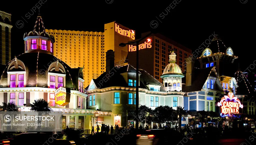 Buildings lit up at night, Harrah's Casino and Hotel, Las Vegas, Nevada, USA